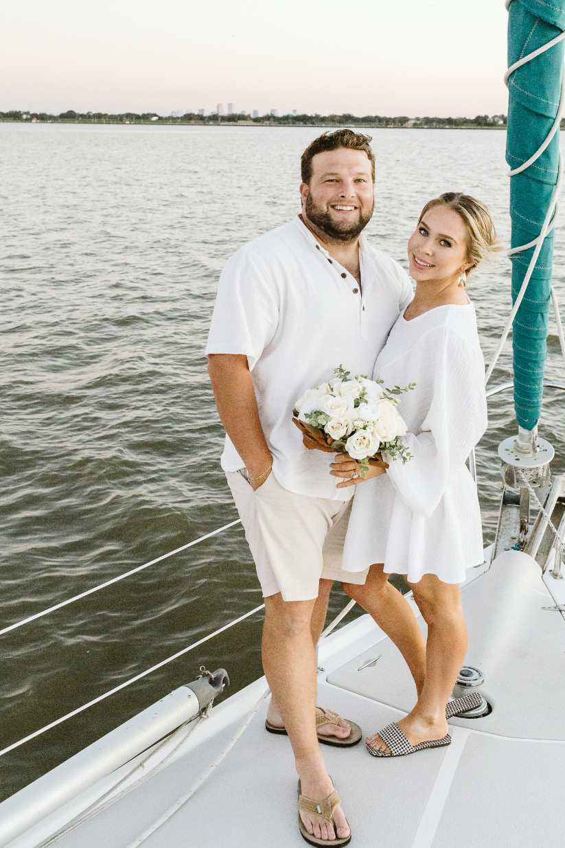 couple marrying on sailboat