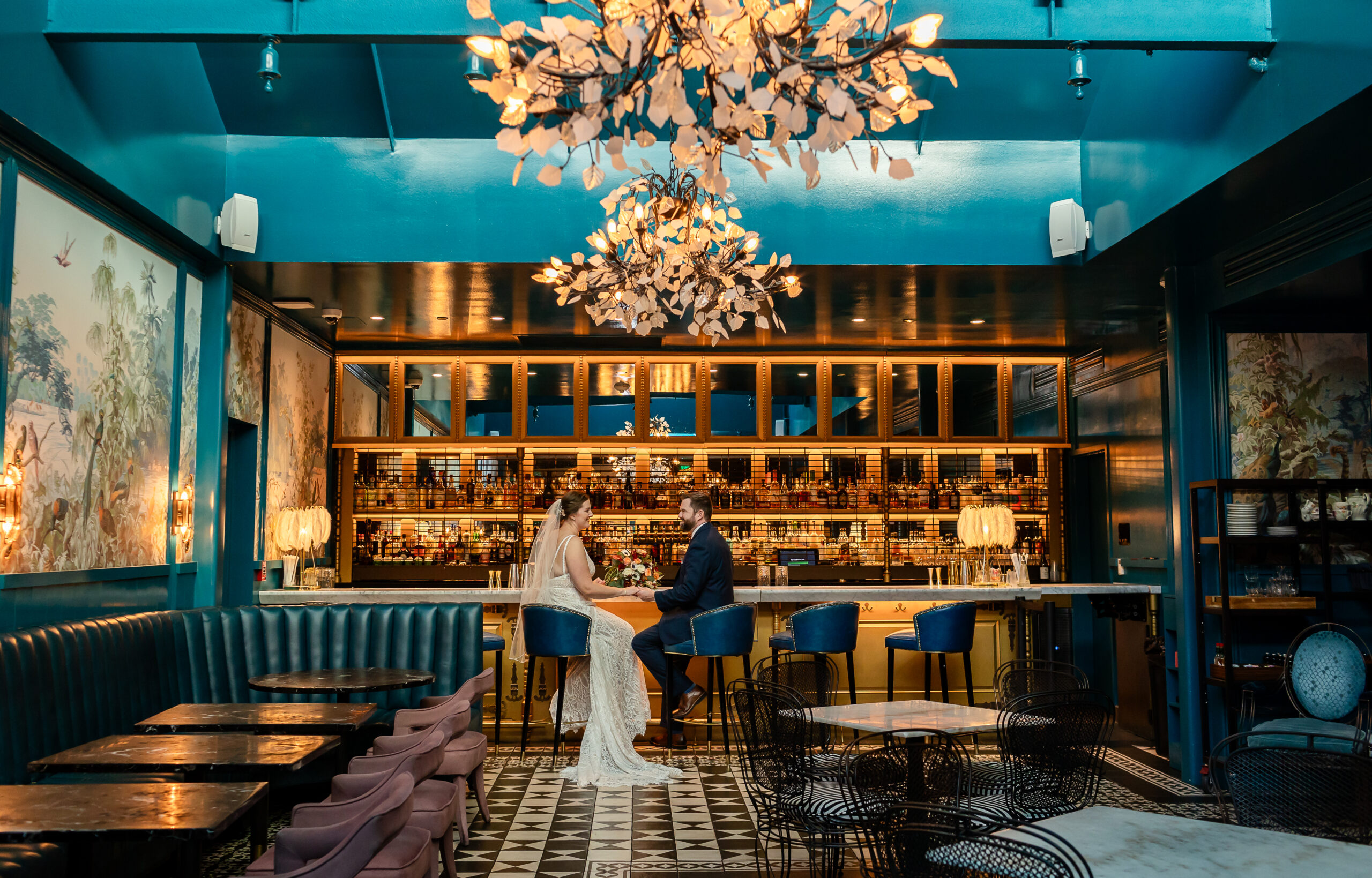 married couple sharing a drink at peacock bar in New Orleans