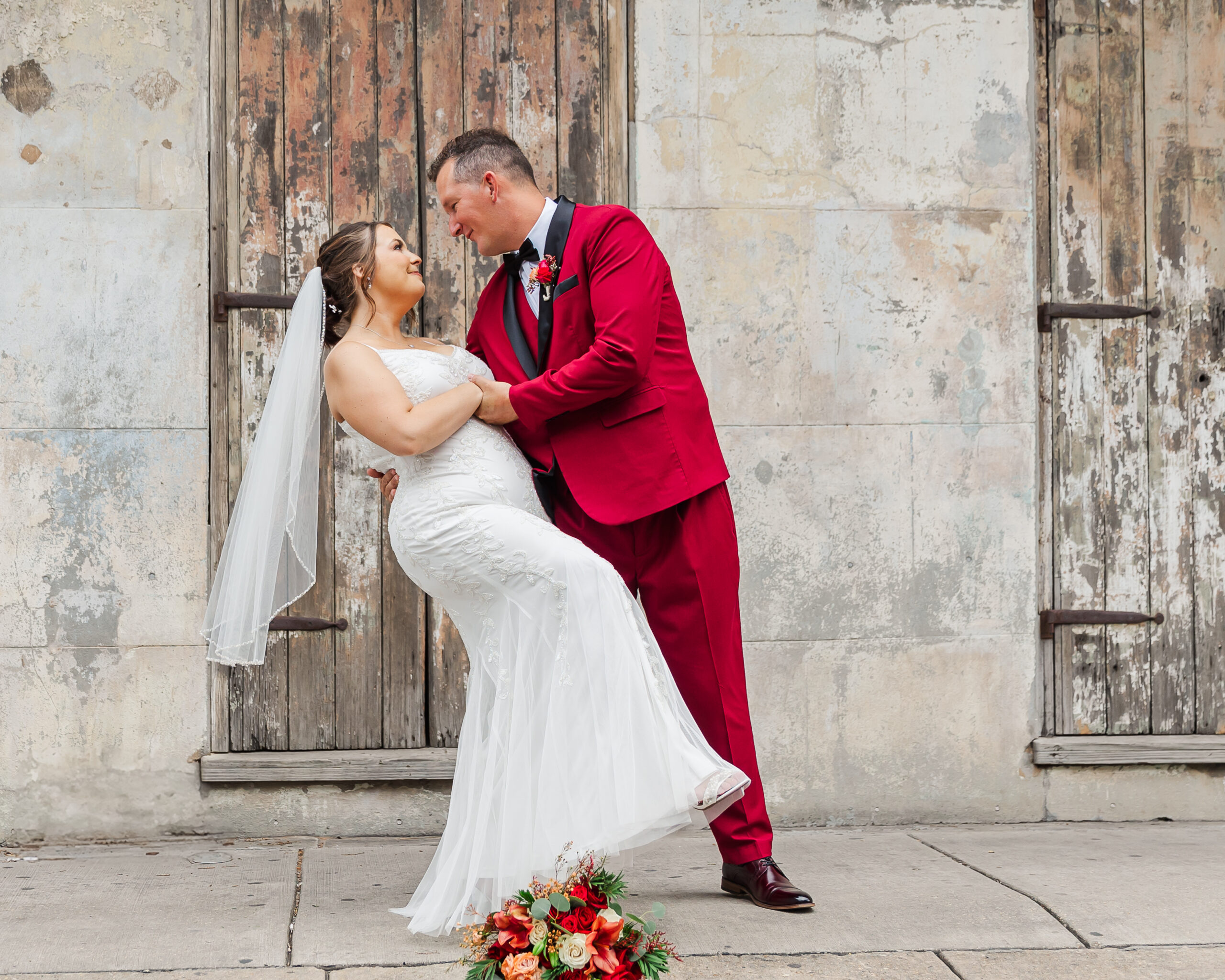 bride and groom dipping for a dynamic photo in New Orleans