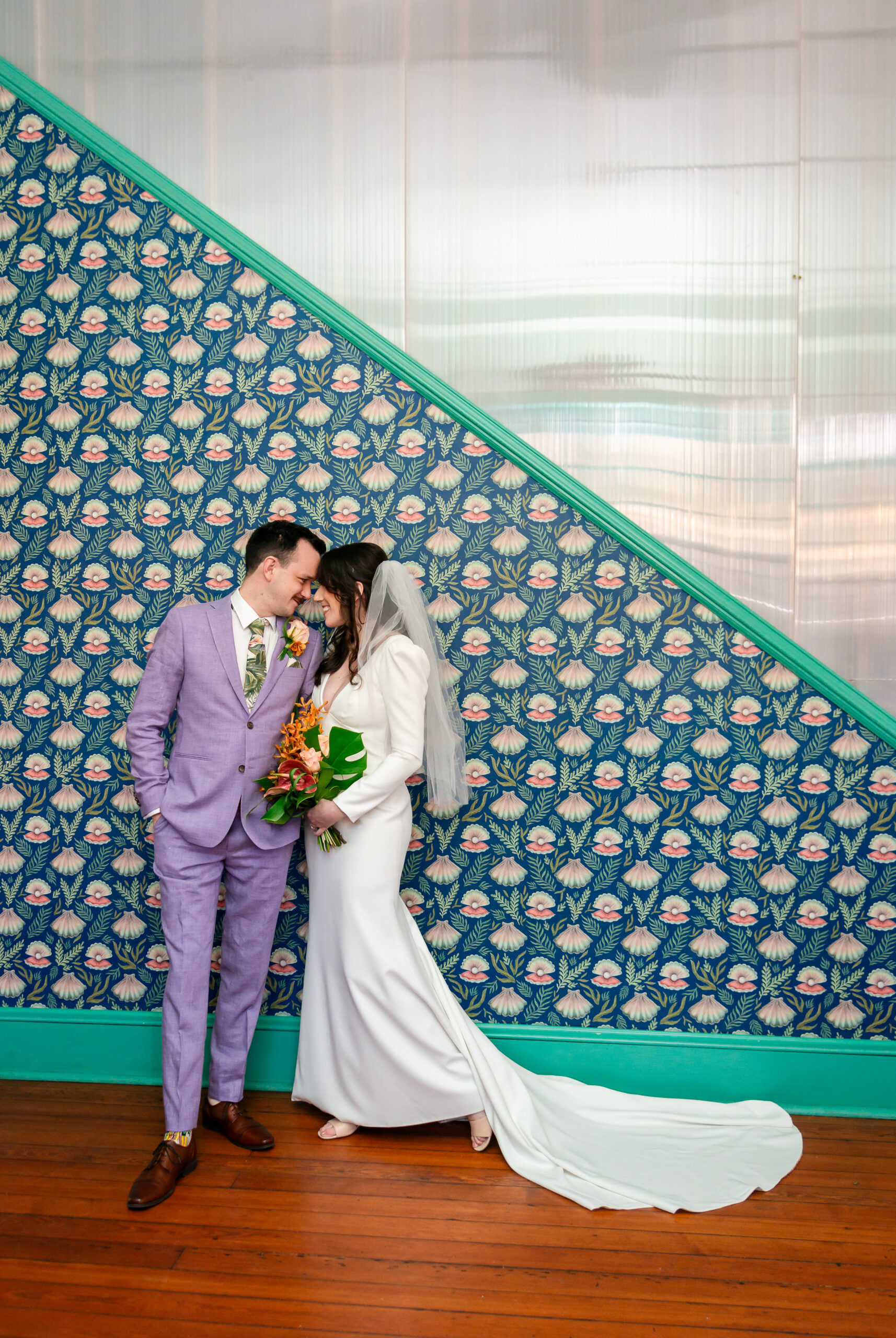 couple in bright wedding attire having a sincere moment on their elopement wedding day