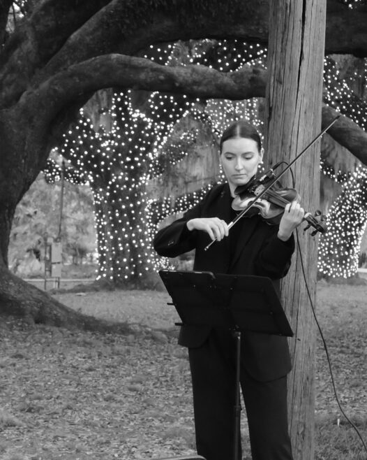 violinist with elopetonola during an elopement in New Orleans