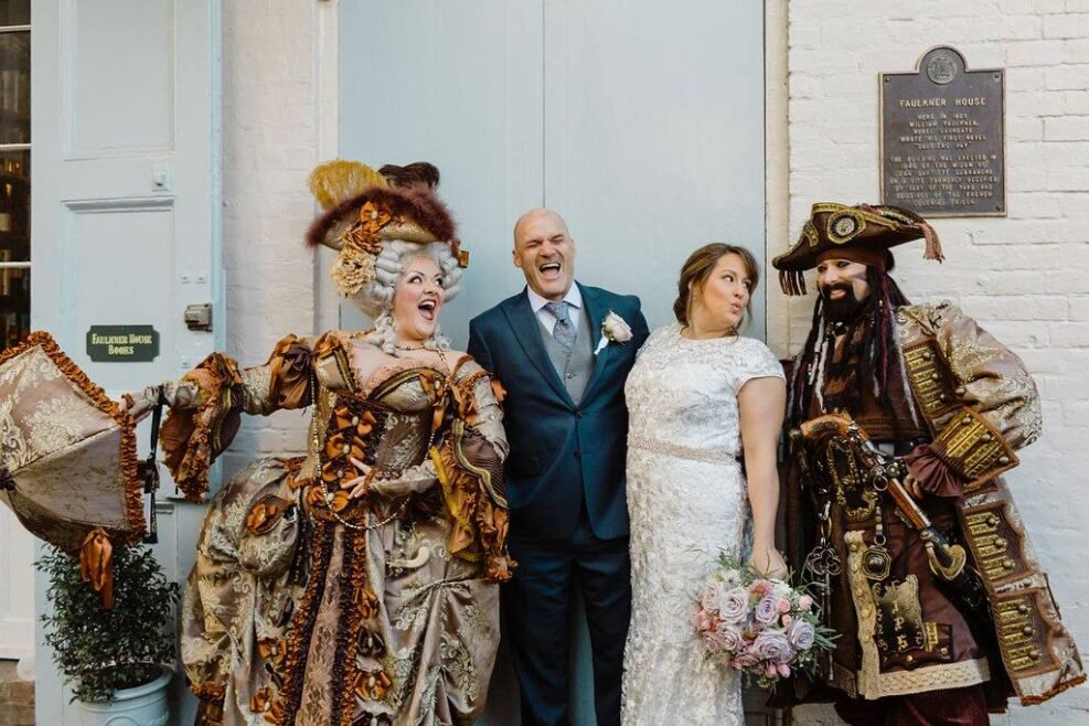 Couple eloping in a pirates alley in New Orleans.