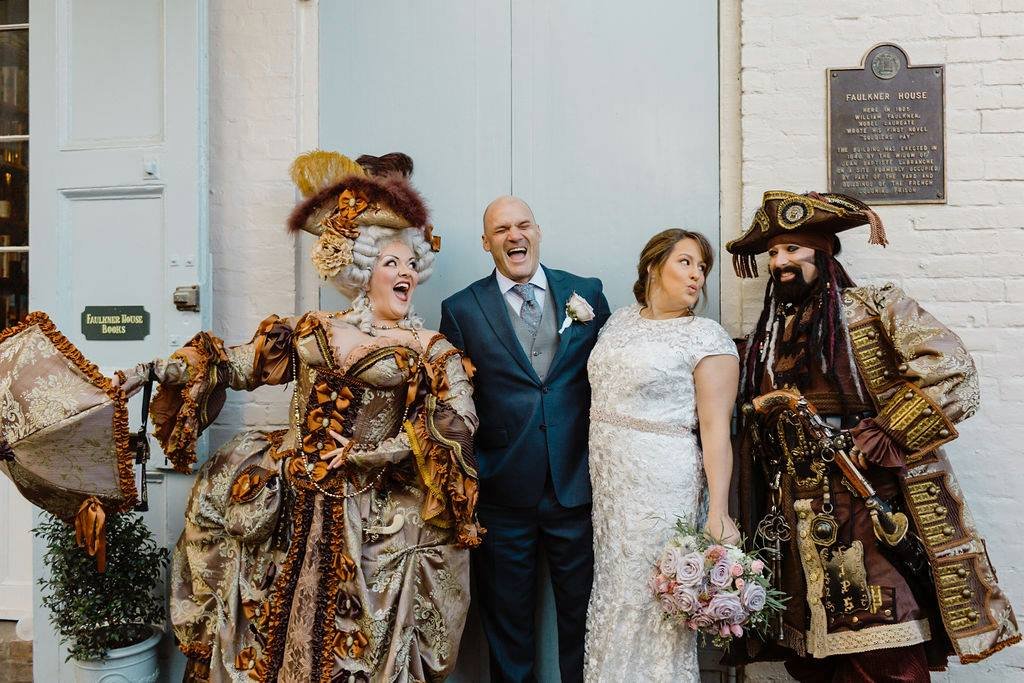 Couple eloping in a pirates alley in New Orleans.