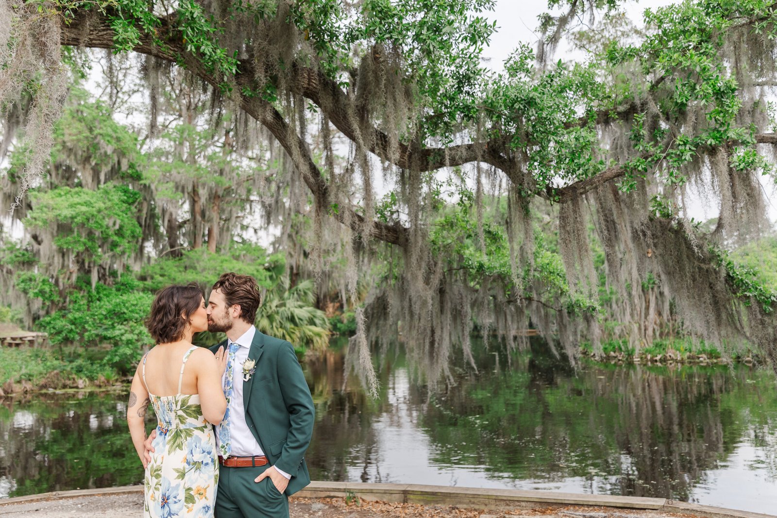 Couple celebrating their City Park elopement in a quiet garden setting