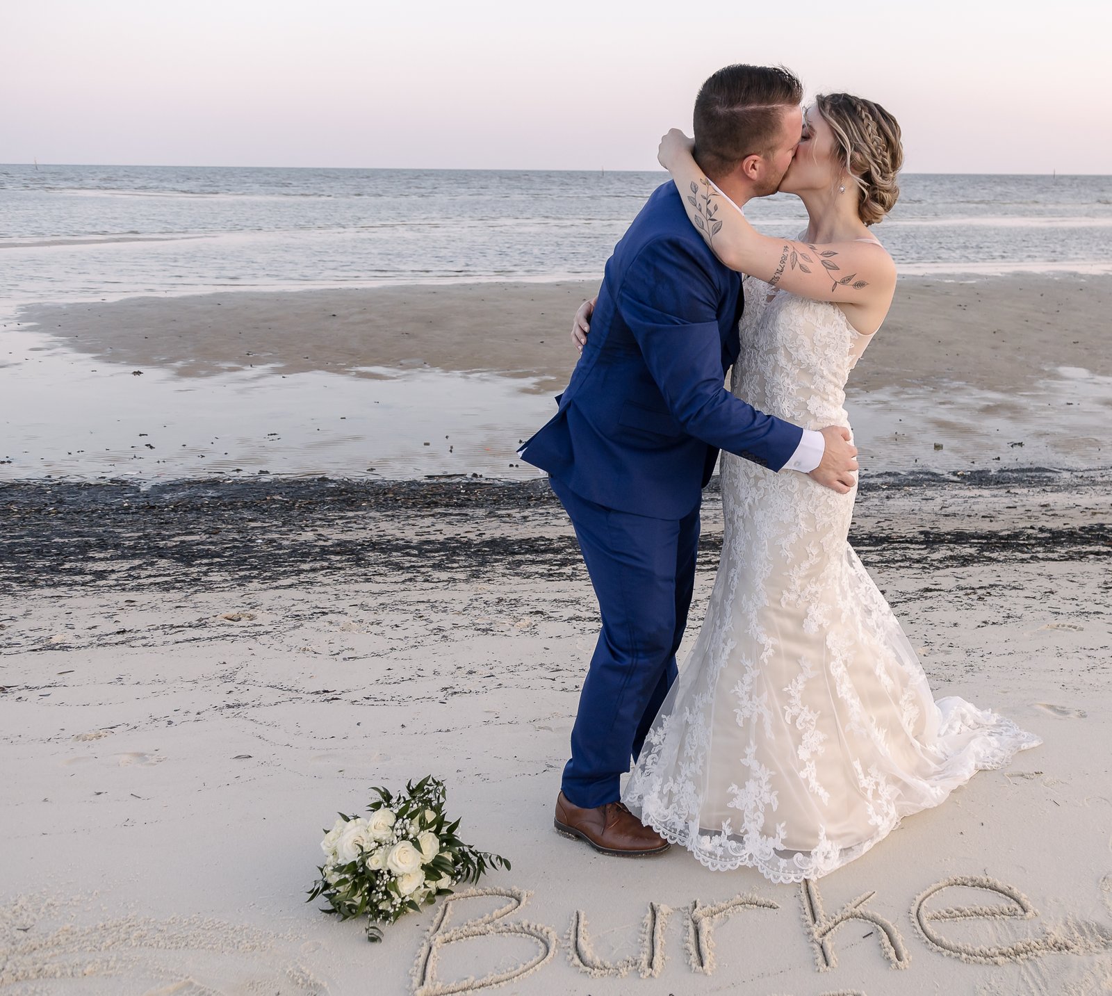 Private beach elopement ceremony under the Biloxi oaks