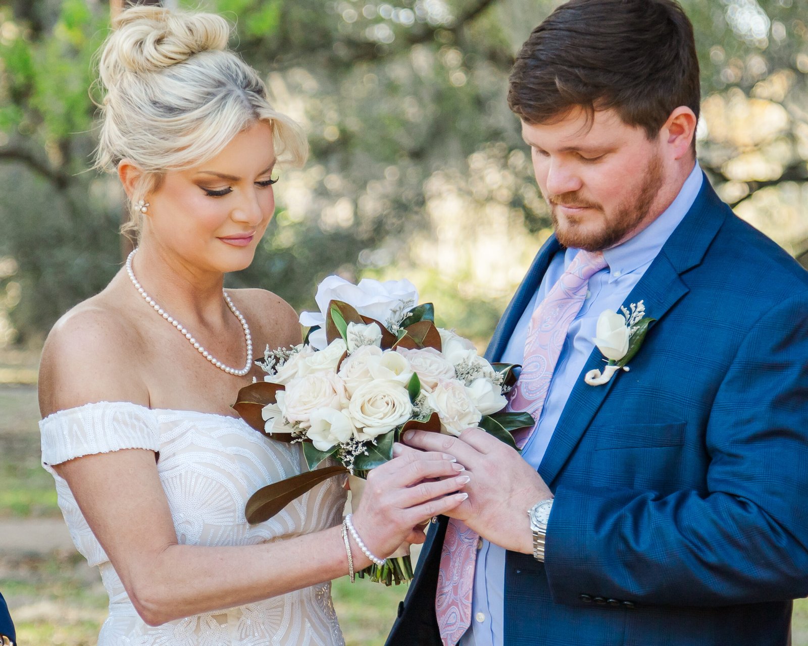 Couple exchanging rings and vows in a quiet City Park location