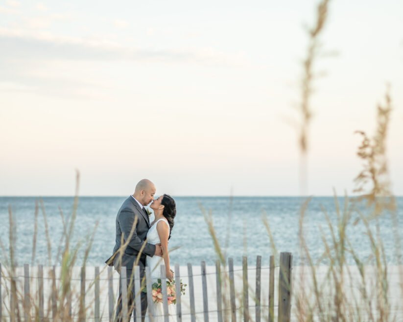 Biloxi elopement couple with beach backdrop