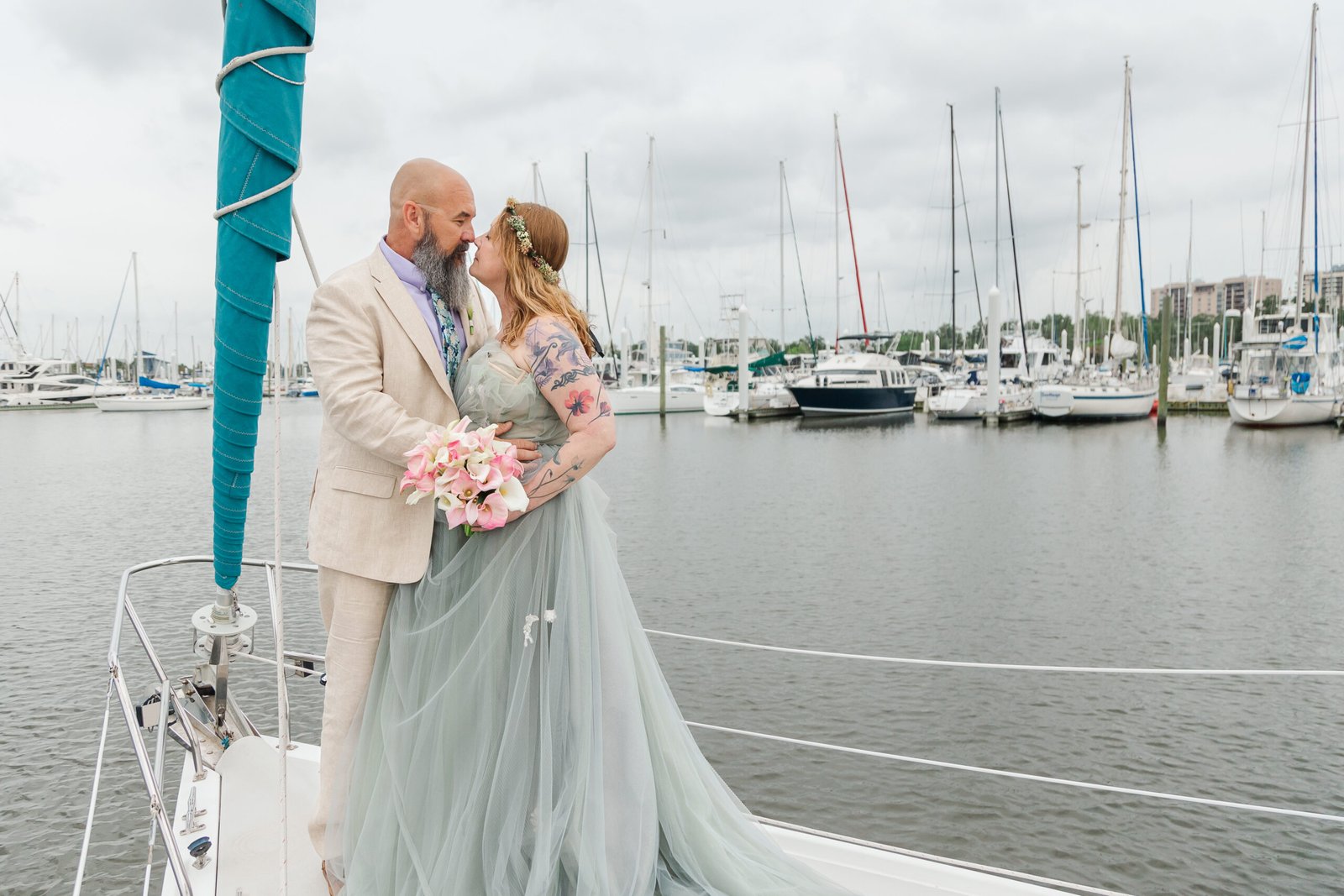 Couple eloping on a sailboat in New Orleans