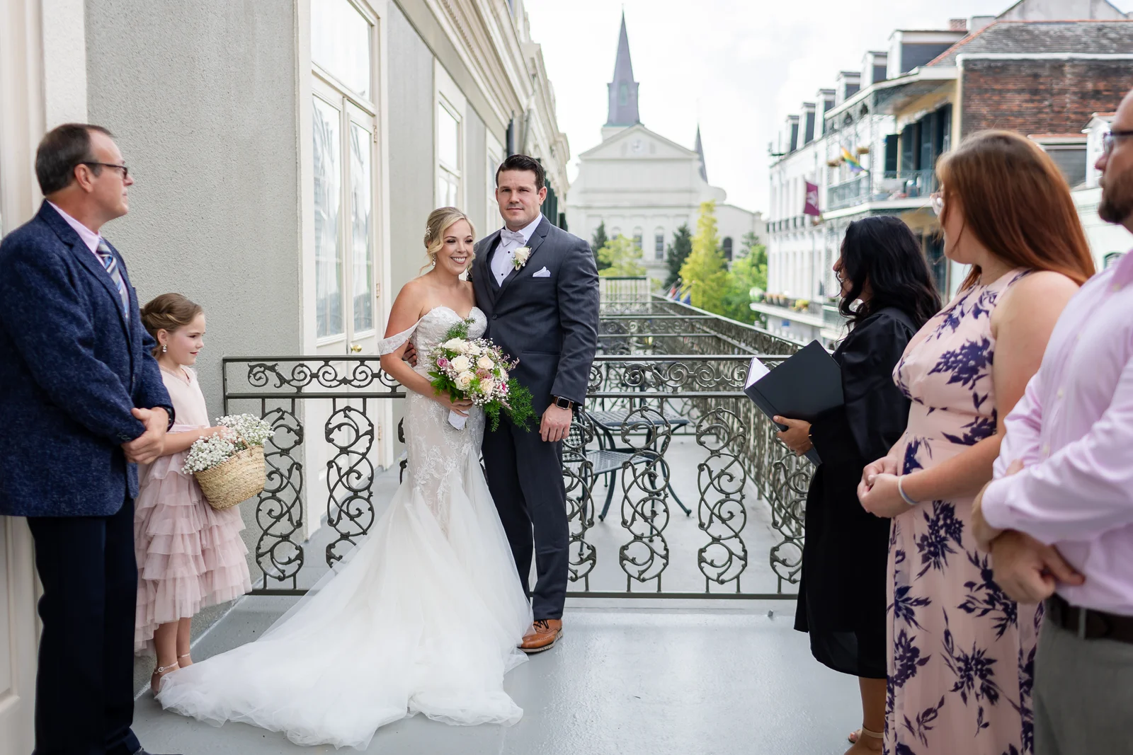 Couple smiling outdoors in New Orleans