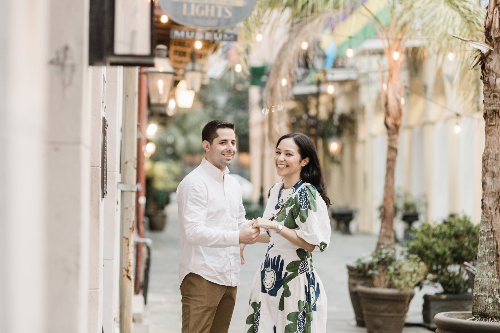 Officiant joins the couple in Exchange Alley for vow renewal