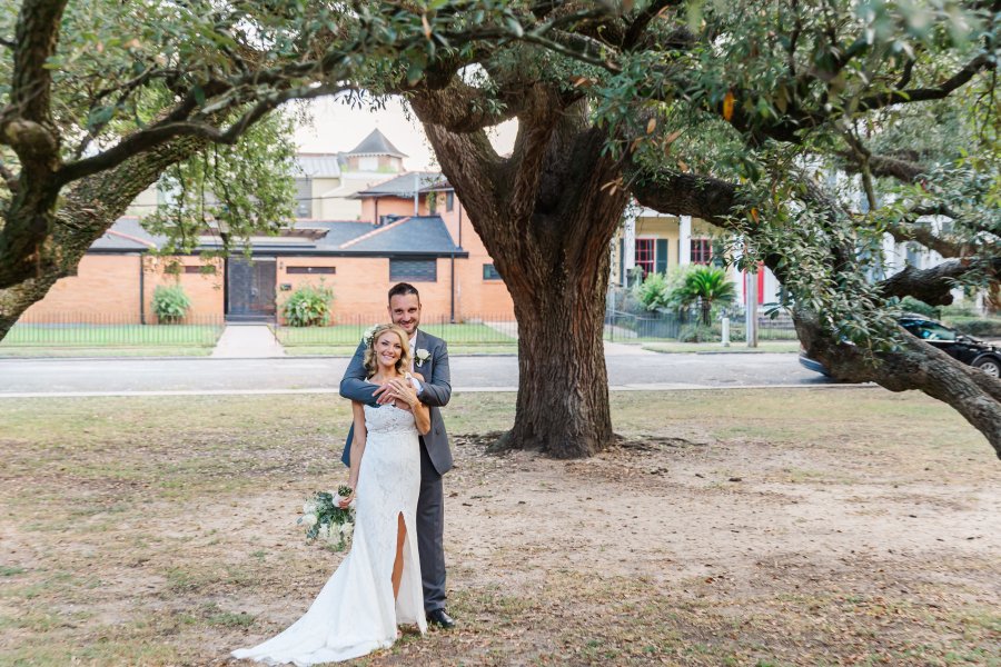 Louisiana elopement couple celebrating under historic oak trees