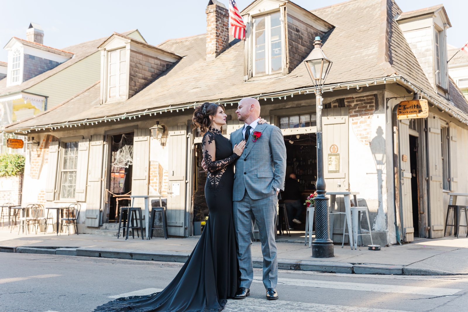 Couple in front of Lafitte blacksmith bar in New Orleans after their intimate elopement