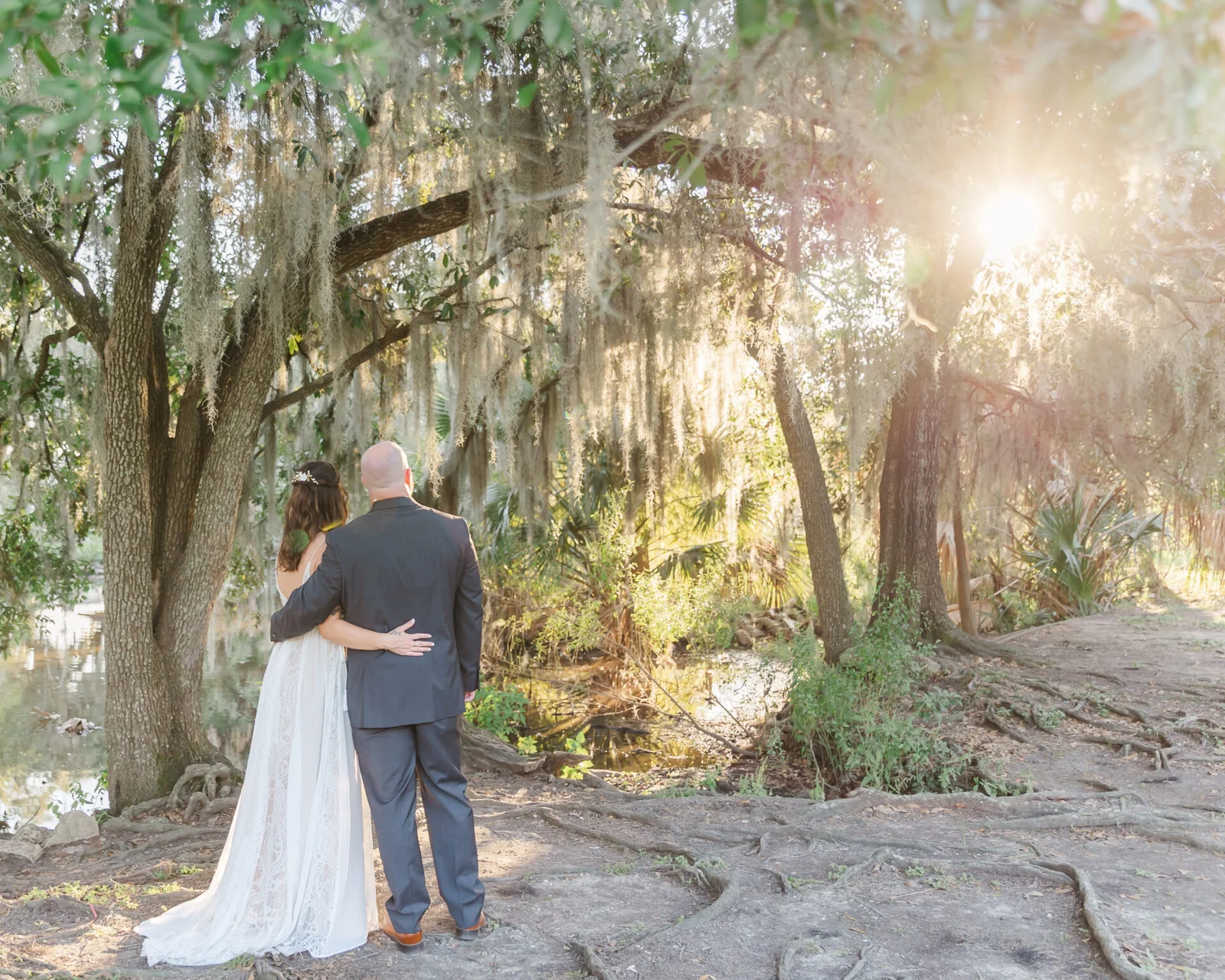 couple at sunset posing after their city park New Orleans elopement