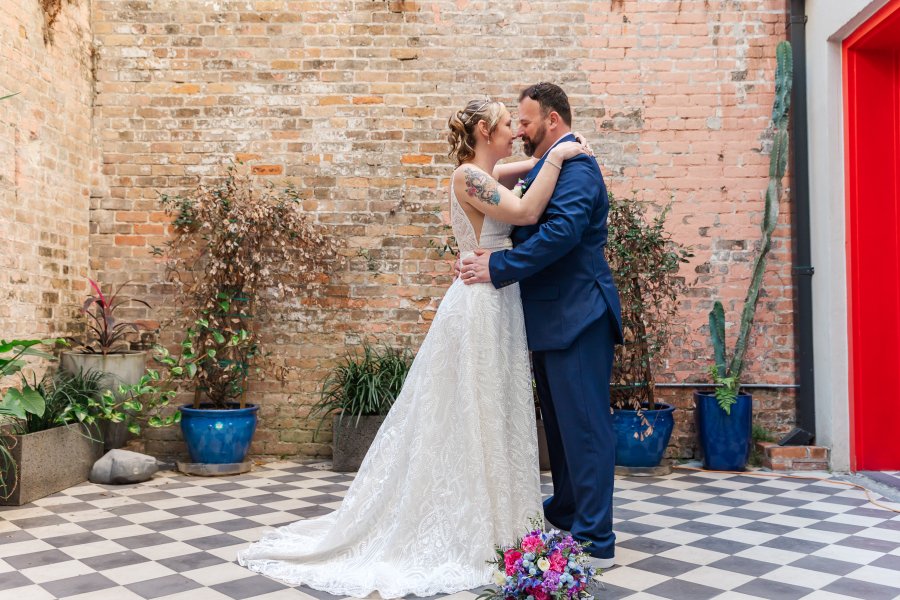 Couple celebrating their wedding at Catahoula Hotel New Orleans