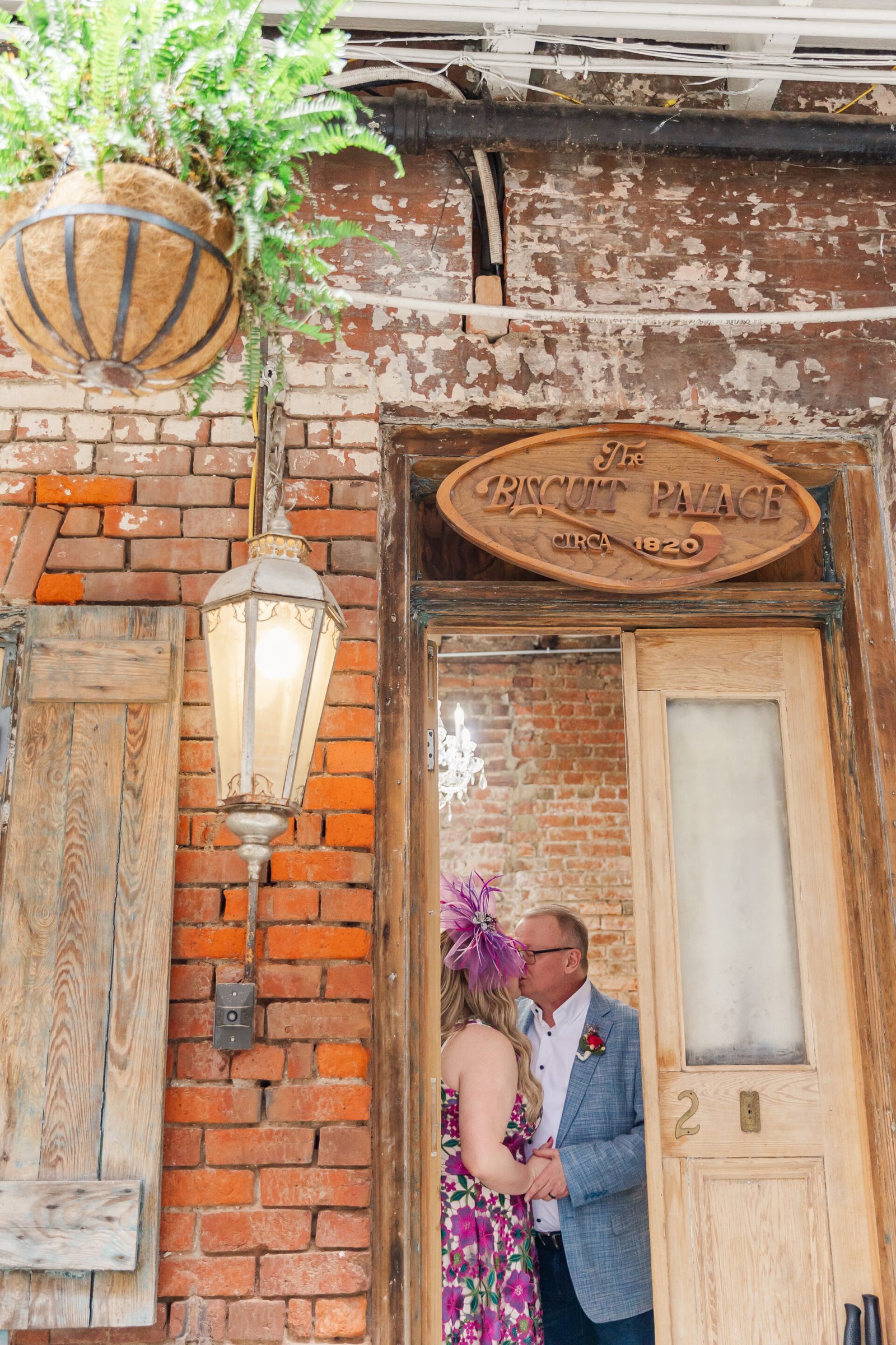 couple having a private moment at their hotel during their New Orleans elopement